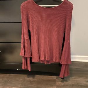 Tight dark red sweater